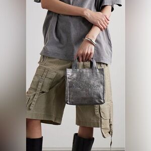 ACNE STUDIOS Embossed distressed metallic denim tote